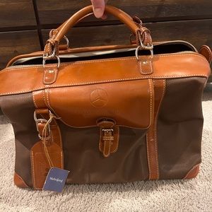 Mulholland brothers leather travel bag, Mercedes Benz logo, kapalua golf.